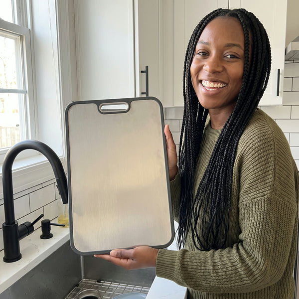 Home cook preparing food on a Titanium Wares cutting board