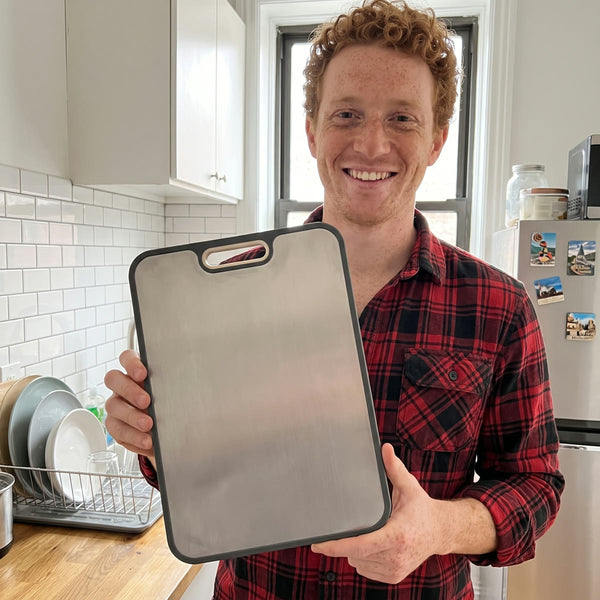 Home cook preparing food on a Titanium Wares cutting board
