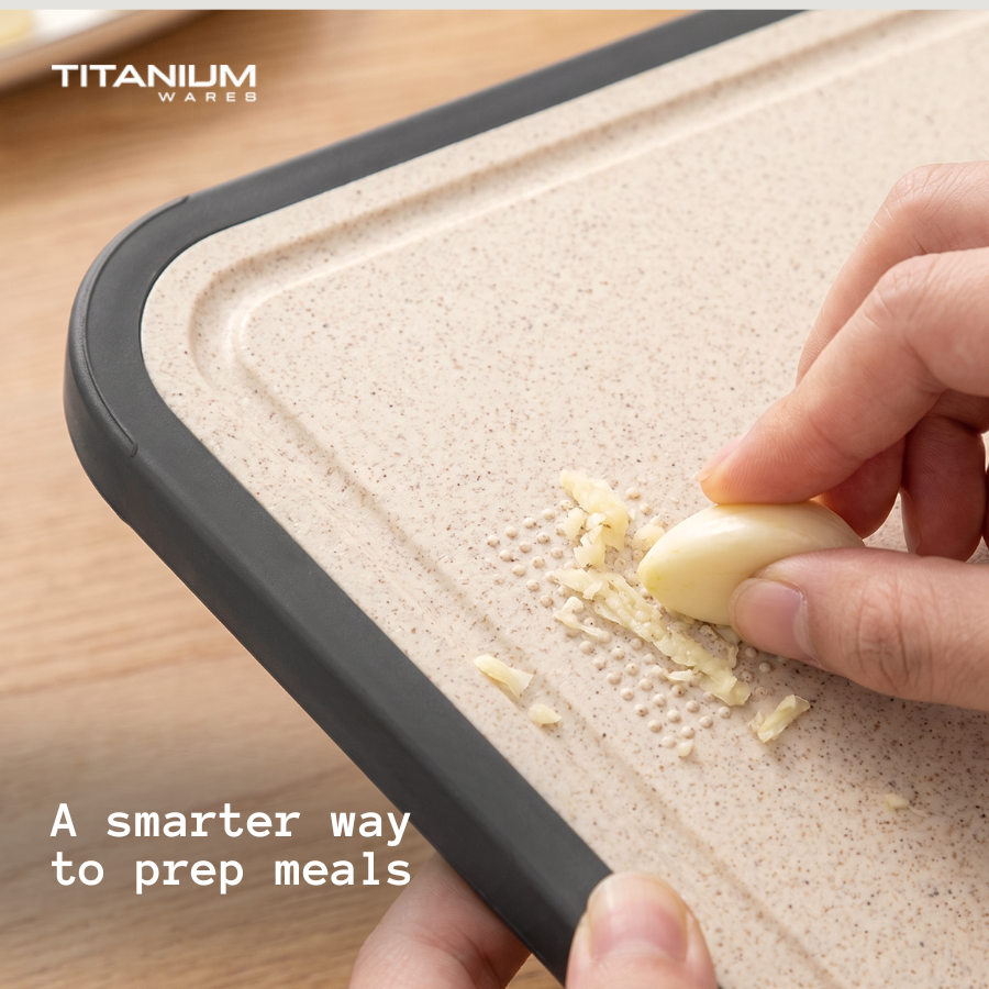 Grating garlic on the built-in grater of the wheat straw side
