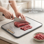 Slicing beef on the smooth titanium cutting surface