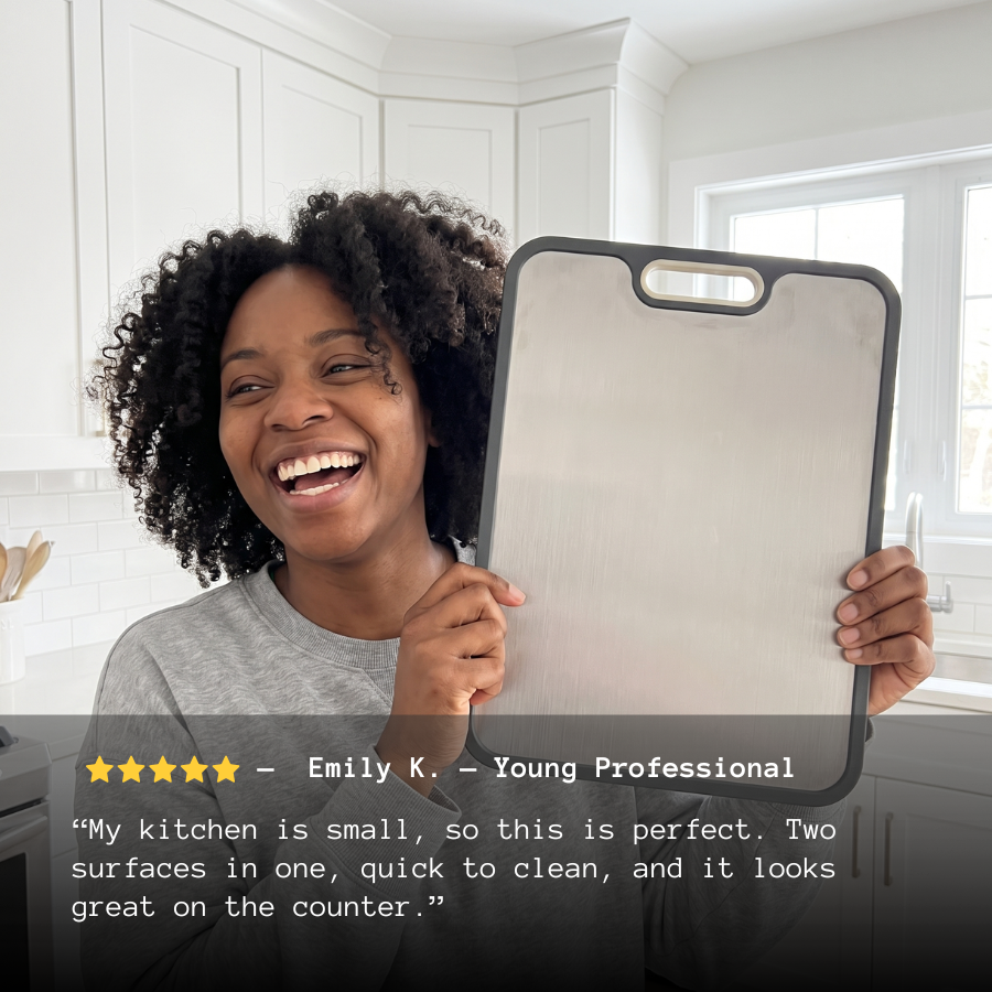 Customer holding the double-sided titanium cutting board in her kitchen