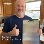Customer holding the titanium side of the double-sided cutting board