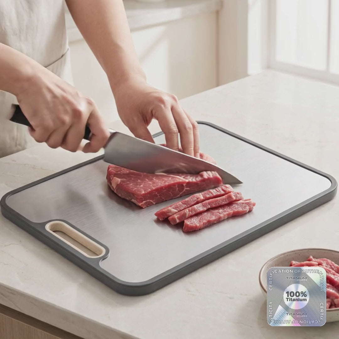 Double-sided titanium cutting board: raw meat on the titanium side, produce on the wheat-fiber side