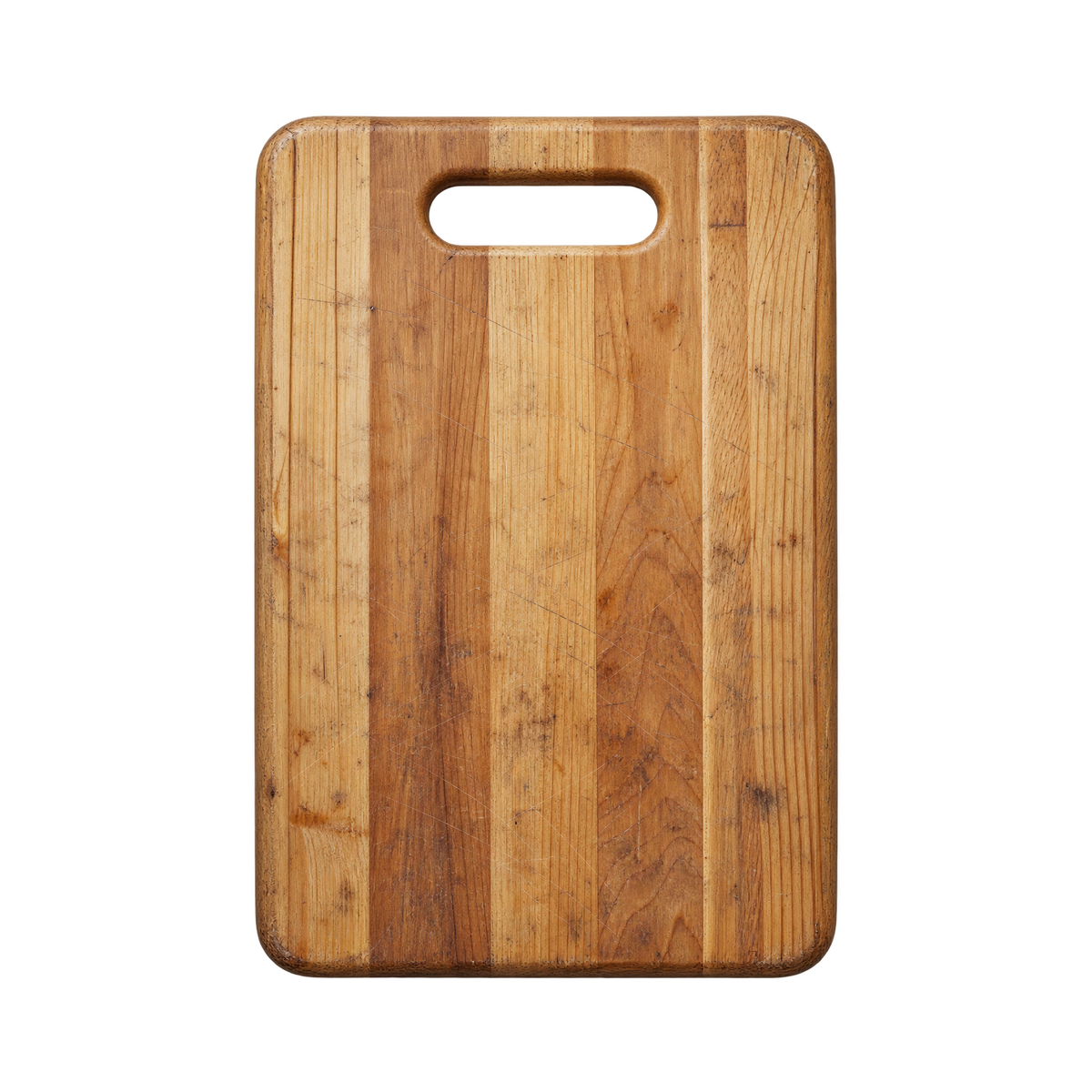 Worn bamboo cutting board with knife scars