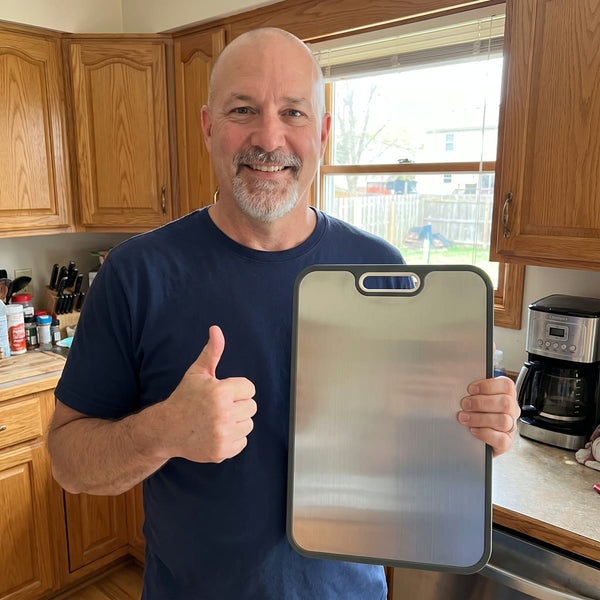 Home cook preparing food on a Titanium Wares cutting board