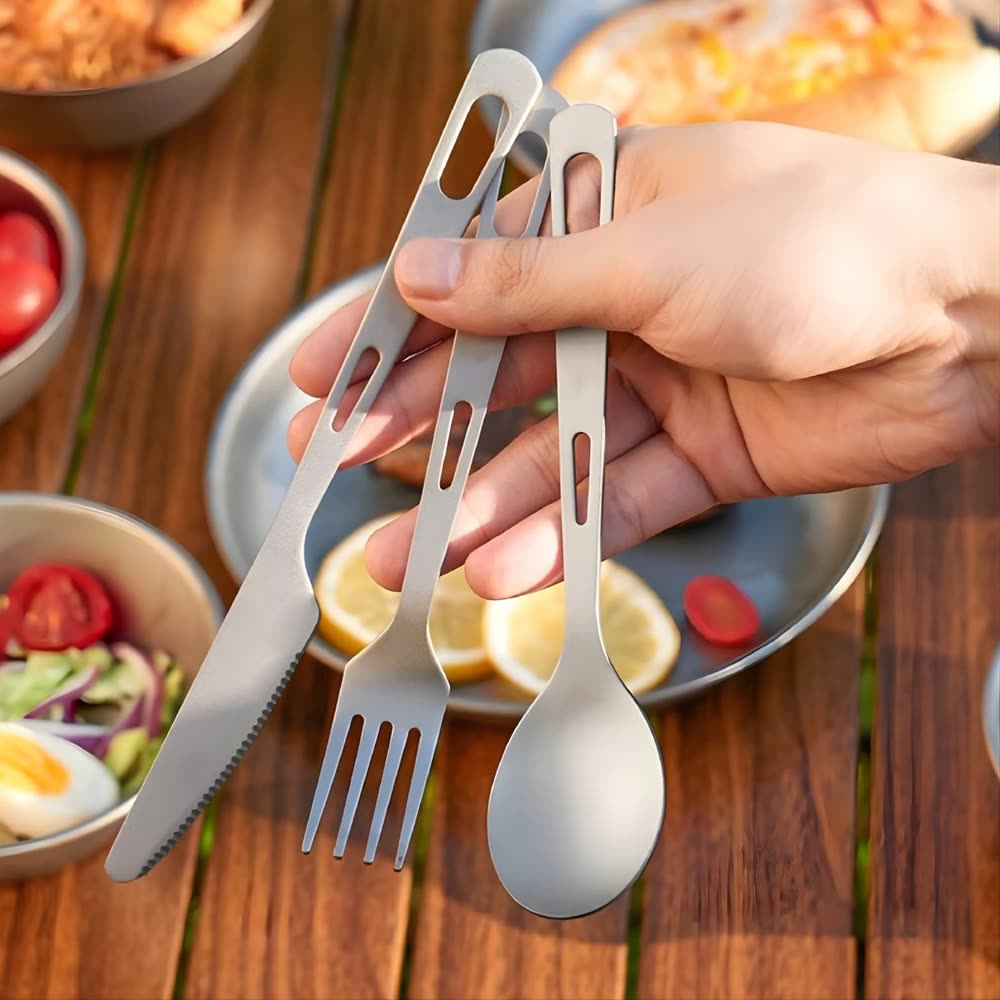 Titanium cutlery set on a set table